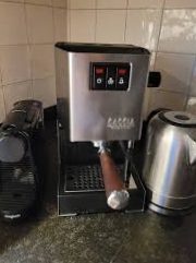 How do you modify the Gaggia MM Steel grinder to grind better?